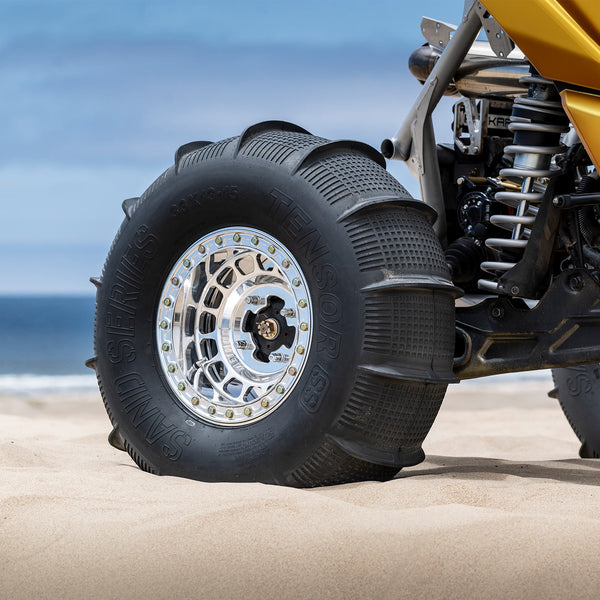 Tensor SS Sand Series paddle tire for UTVs with Velocity Grid design, 33 and 35 inch sizes, for ultimate sand traction and control.