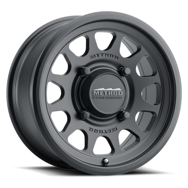 Method 414 Bead Grip Matte Black UTV Wheel with 12-window design, bead hump, and 1600 lb rating for off-road and trail use.