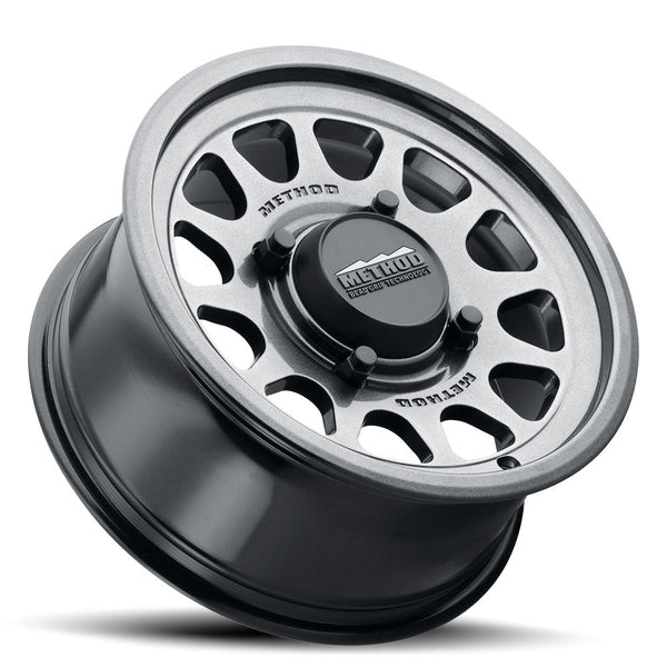 Method 414 Gloss Graphite Bead Grip® UTV Wheel with 12-window design, bead hump, and 1600 lb load rating for dunes and rugged terrain.