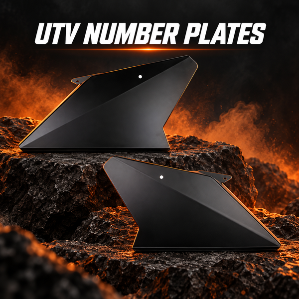 Pair of DRT Motorsports black aluminum UTV number plates on a dark orange-accent background