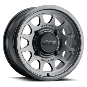 Method 414 Gloss Graphite Bead Grip® UTV Wheel with 12-window design, bead hump, and 1600 lb load rating for dunes and rugged terrain.