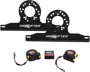 High Lifter UTV alignment tool kit laid out with two steel hub plates, two tape measures and a magnetic digital angle finder