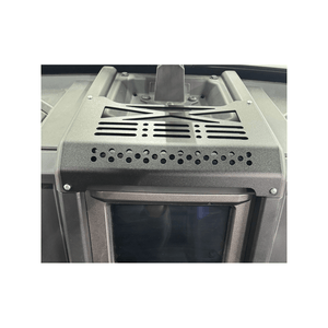 Polaris Xpedition center dash panel by AJK Offroad, showing the black body panel with cutouts and mounting points.