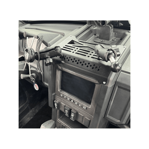 AJK Offroad Polaris Xpedition center dash panel in black plastic, showing the textured surface and mounting points.
