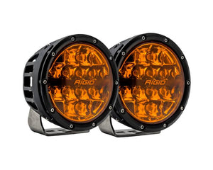 Rigid 360-Series 6in Amber PRO fog light pair with white housing, amber backlight, and high-output optics for harsh off-road conditions.