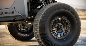 Method 415 Double Black UTV Beadlock Wheel with matte black face, gloss beadlock ring, 1600 lb rating, and aggressive multi-spoke design.
