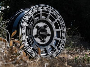 Gloss Graphite Method 415 UTV Beadlock Wheel with matching beadlock ring, multi-window design, and 1600 lb load rating for off-road power.