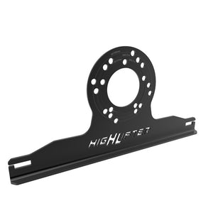 High Lifter alignment plate bolted to a UTV wheel hub with the lug nuts holding it against the mounting face