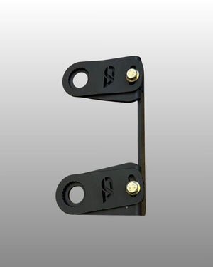 Close view of the CA Tech USA retainer holding a Maverick R lower arm bolt in place