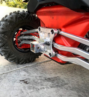 Billet aluminum radius rod plate for Can-Am X3 enhances rear suspension strength and includes optional hitch or D-ring receiver