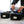 Rugged Radios adventure van cabinet bags loaded with handheld radios, tools and gear inside a van cabinet