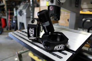 5150 billet whip mount, pair of billet whip mounts on a bench