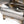 RPM logo detail on the CFMoto Z10 Dual Sport muffler body