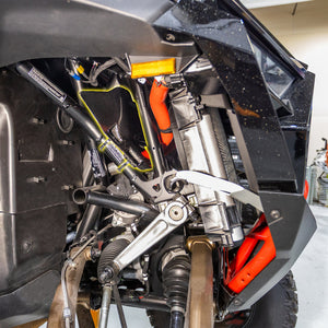 Carbon fiber RPM heat deflector for Polaris Pro R and Turbo R, mounted behind the radiator to reduce cab temperatures effectively.