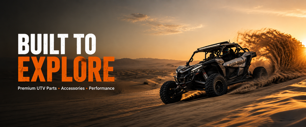 A side-by-side UTV off-road vehicle driving across sandy dunes at sunset, with large text on the left reading 'BUILT TO EXPLORE' and smaller text 'Premium UTV Parts • Accessories • Performance'.
