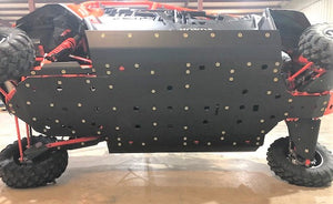 Trail Armor skid plates installed on a Honda Talon 4-seat ATV, showing durable protection for the vehicle's undercarriage.