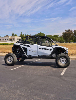 PRP RZR Pro R4 front window net mounted to factory cage