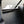 Dark tinted polycarbonate rear window for RZR XP 1000 and Turbo models with quick strap install and removable harness access panels