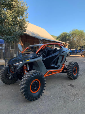 L&W Fab Polaris Turbo R 2-seat roll cage for added safety and durability in off-road adventures.