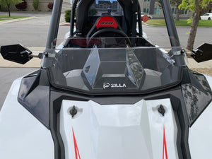 UTVZILLA clear polycarbonate half windshield for Polaris RS1 with billet mounts and quick-release knobs