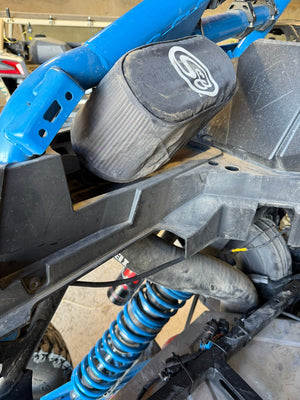 Ibexx cold air intake fitted to a turbocharged Polaris RZR Pro R, drawing air from outside the bed