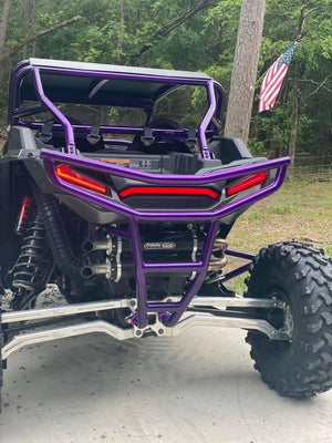 L&W Fab Polaris RZR Turbo S radius rods, direct bolt-on replacement with sturdy metal construction, shown installed on vehicle suspension.