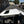 Low-profile Moto Armor Fast Back Aluminum Roof with sunroof and rear spoiler for Polaris RZR XP 1000, Turbo, and 900 UTVs.