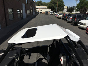 Low-profile Moto Armor Fast Back Aluminum Roof with sunroof and rear spoiler for Polaris RZR XP 1000, Turbo, and 900 UTVs.