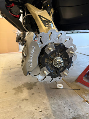 Madigan Motorsports Defender Big Brake Kit on a Can-Am Defender — detail