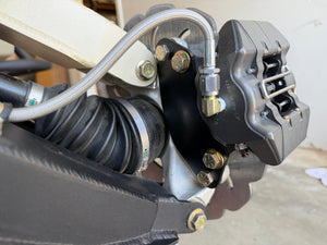 Madigan Motorsports Defender Big Brake Kit on a Can-Am Defender — close-up