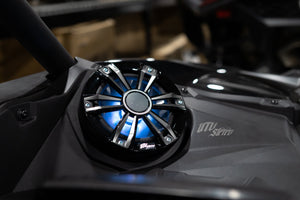 UTV Stereo speaker with LED lighting mounted in a Can-Am X3 dashboard