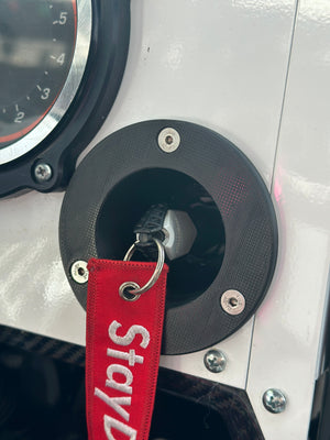 StayFlush Motorsports key fob mount fitted to Can-Am Maverick X3 carbon fiber dash