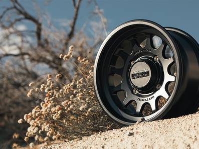 Method 414 Bead Grip Matte Black UTV Wheel with 12-window design, bead hump, and 1600 lb rating for off-road and trail use.