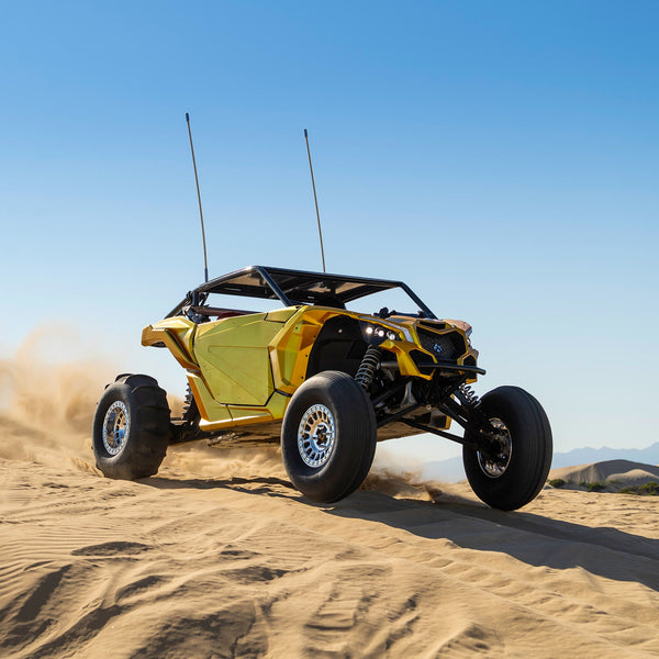 Tensor SS Sand Series paddle tire for UTVs with Velocity Grid design, 33 and 35 inch sizes, for ultimate sand traction and control.