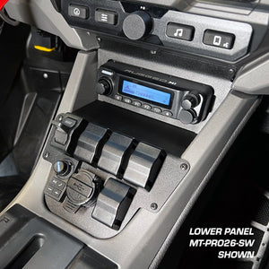 Rugged Radios RZR Pro R lower panel installed below the radio mount with rocker switches in the dash
