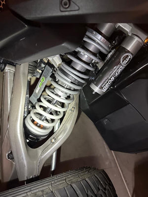 MTS Off-Road front limit strap kit installed on RZR Pro R and Turbo R, showing durable straps attached to the vehicle suspension.