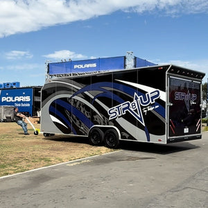 Heavy-duty TRAILER-TUG MONSTER-TUG towing device in black with rugged design, shown in use on a towing vehicle.