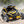Can-Am Maverick R with RPM carbon fiber hood installed during off-road driving