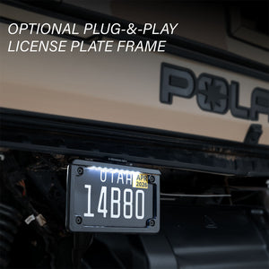 LED-illuminated license plate frame accessory for a street-legal UTV turn signal kit