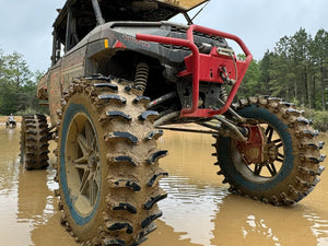 System 3 XT400W mud tire mounted on UTV off-road