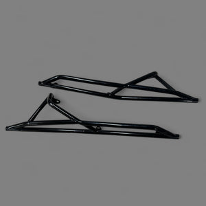 L&W Fab Polaris RZR Pro R 2 seat rock sliders and tree kickers mounted on the side of the off-road vehicle for protection.