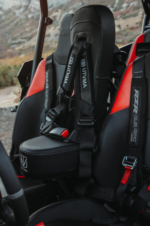 Polaris RZR 1000 rear bump seat for 2024-2025, UTV Mountain Accessories, showing durable seat with mounting hardware.