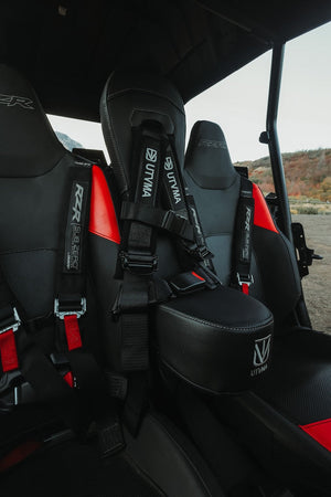Polaris RZR 1000 front bump seat by UTV Mountain Accessories for 2024-2025 model, shown in black with cushioning and mounting hardware.