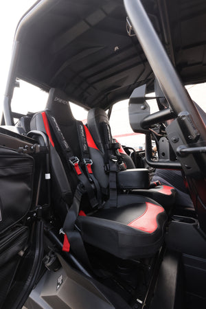 Polaris RZR 1000 rear bump seat by UTV Mountain Accessories, designed for 2024–2025 models, shown in black with mounting hardware.