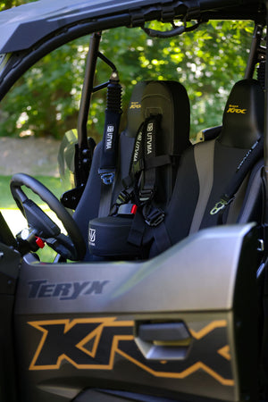 Kawasaki KRX 1000 front bump seat for kids by UTV Mountain Accessories, shown installed on the vehicle's front area.