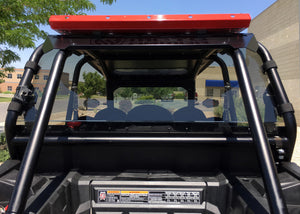 Dark tinted polycarbonate rear window for RZR XP 1000 and Turbo models with quick strap install and removable harness access panels