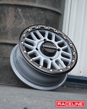 Raceline A93SG Podium Beadlock UTV wheel in stealth grey with 8-spoke mesh design, forged ring, and race-proven off-road durability