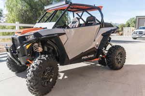 Madigan Motorsports RZR XP 1000 2-Seat Roll Cage on a Polaris RZR XP 1000 — angle view