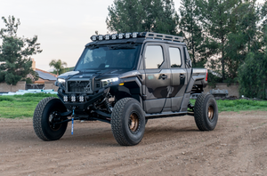 Madigan Motorsports XPedition Long Travel Kit on a Polaris XPedition — fitted view