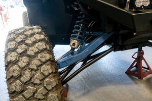 Madigan Motorsports XPedition Long Travel Kit on a Polaris XPedition — profile view